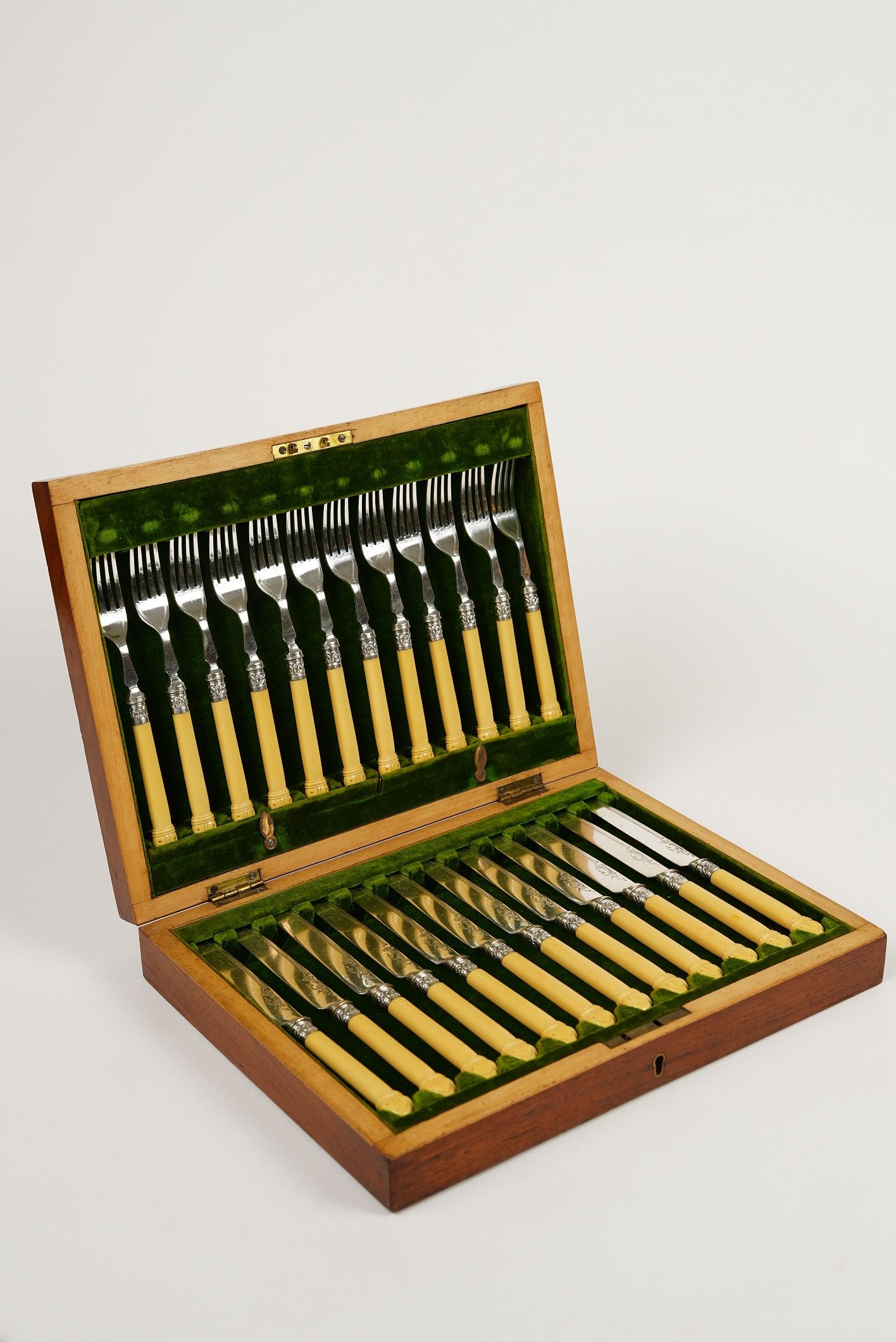 Antique Dinner Forks & Knives with Ornate Handles