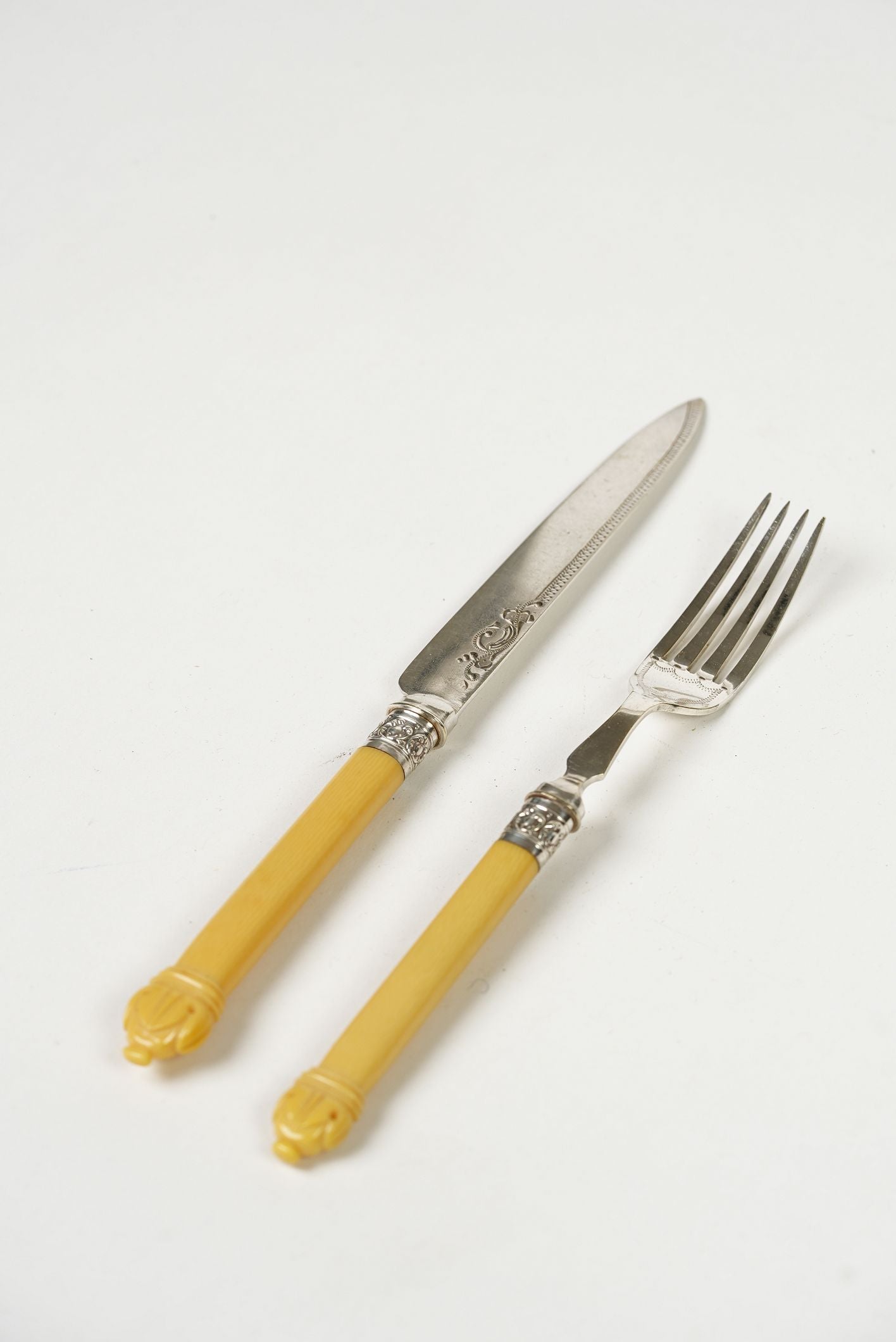 Antique Dinner Forks & Knives with Ornate Handles