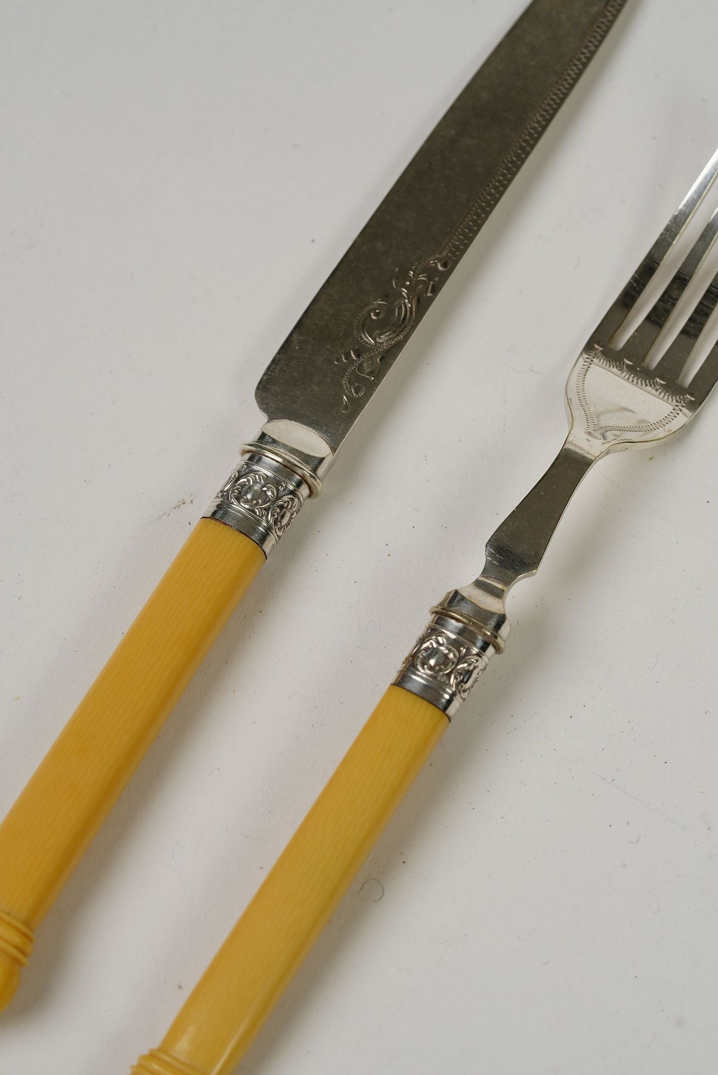 Antique Dinner Forks & Knives with Ornate Handles