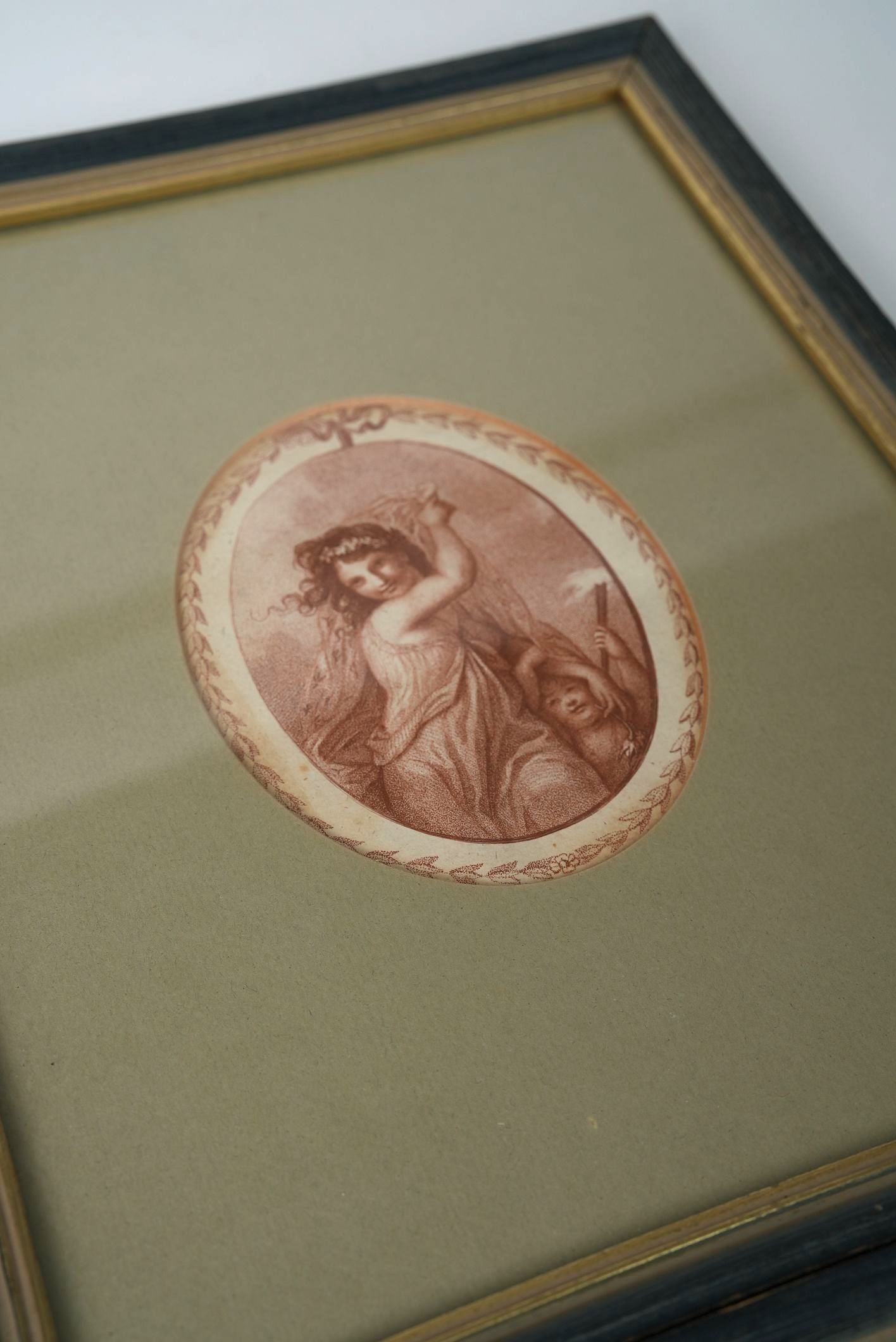 Framed Print with Classical Cherub Motif