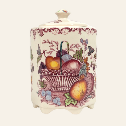 A vintage Mason's Ironstone ceramic jar with a red transferware design featuring an fruit basket motif.