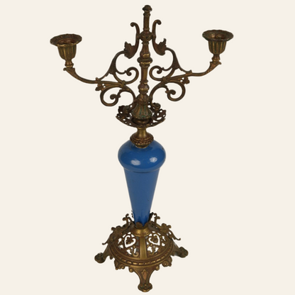 Antique French brass and cobalt blue porcelain candle stands with ornate scrollwork and multiple candle holders.
