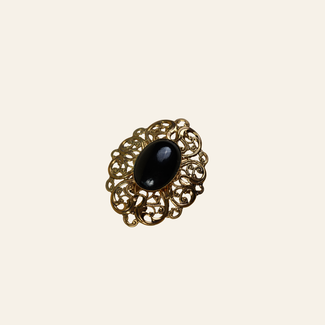 Vintage Black Cabochon Brooch in Gold-Tone Filigree Frame