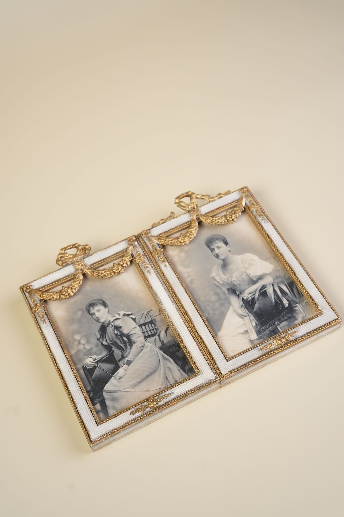 Pair of Victorian Gilt Bow Picture Frames with Original Portraits