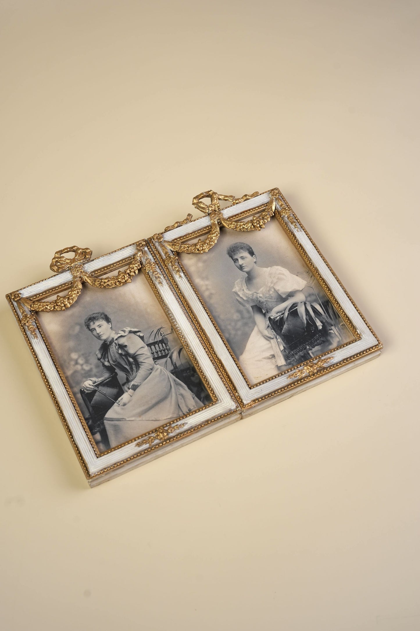Pair of Victorian Gilt Bow Picture Frames with Original Portraits