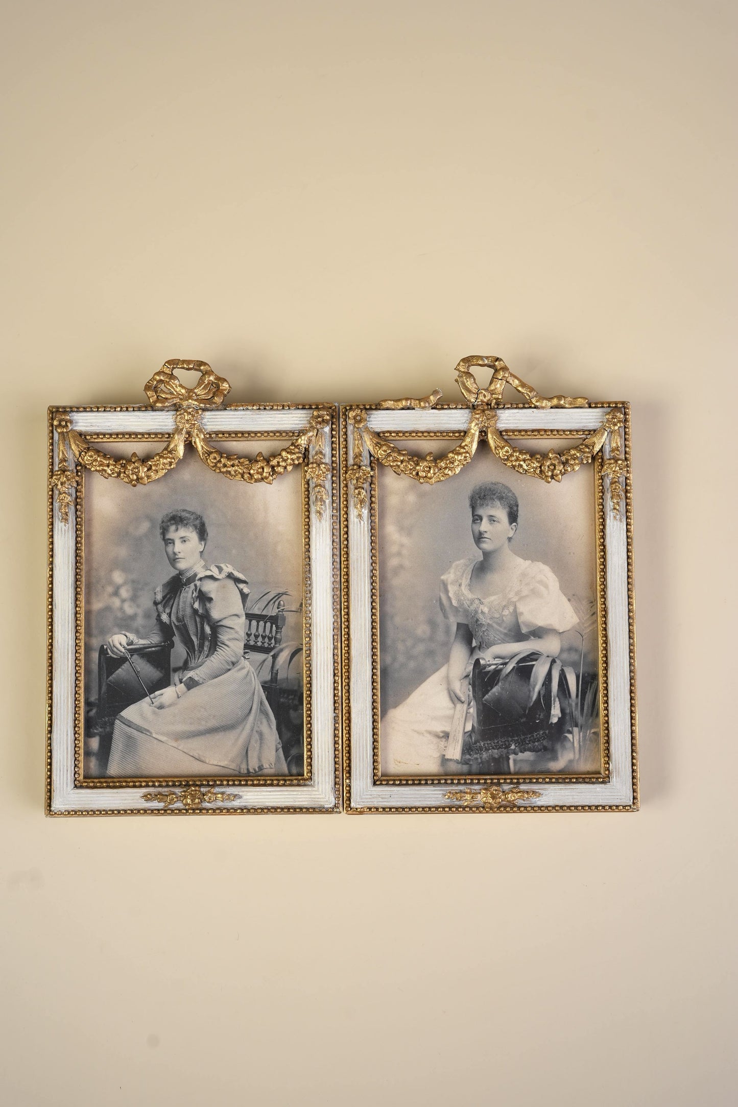 Pair of Victorian Gilt Bow Picture Frames with Original Portraits