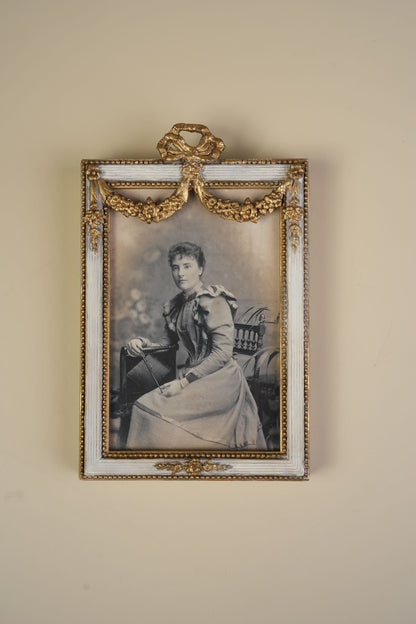 Pair of Victorian Gilt Bow Picture Frames with Original Portraits