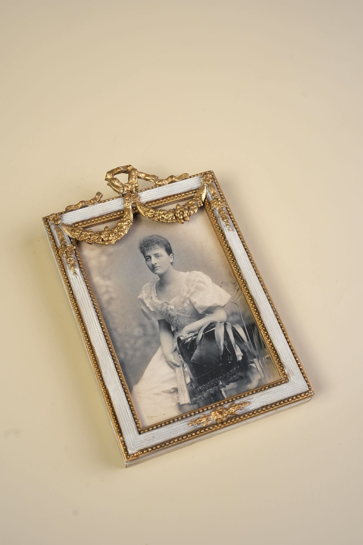 Pair of Victorian Gilt Bow Picture Frames with Original Portraits