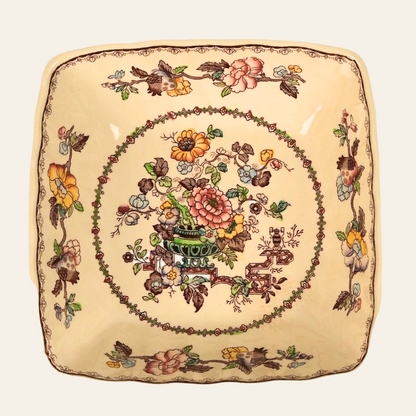Antique square-shaped Mason's Ironstone bowl with a vibrant floral pattern in ochre, cobalt, rust, and green colors, featuring hand-colored Orientalist motifs and hand-painted enamel highlights.
