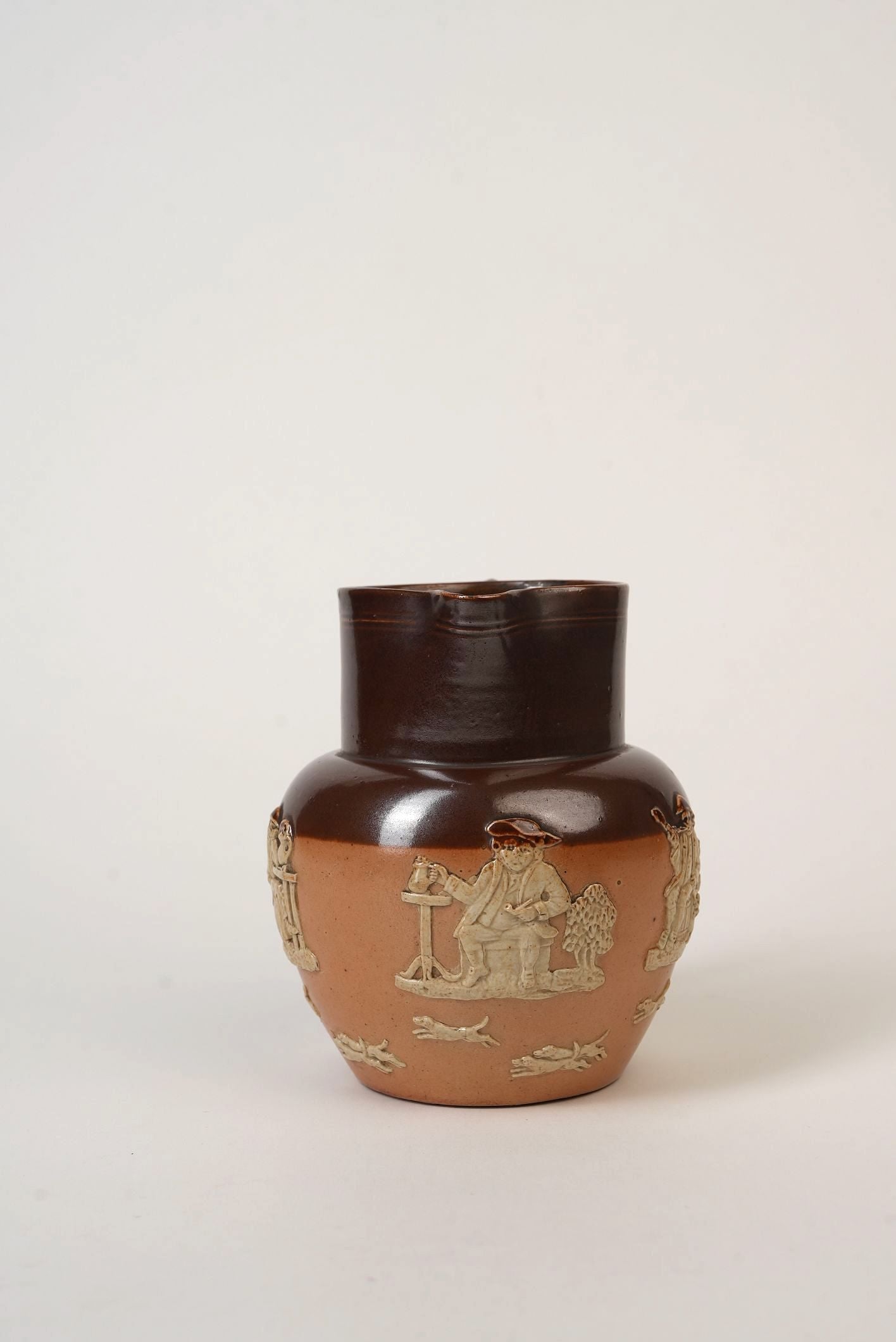 Royal Doulton Stoneware Jug with Moulded Farming Scenes, Edwardian