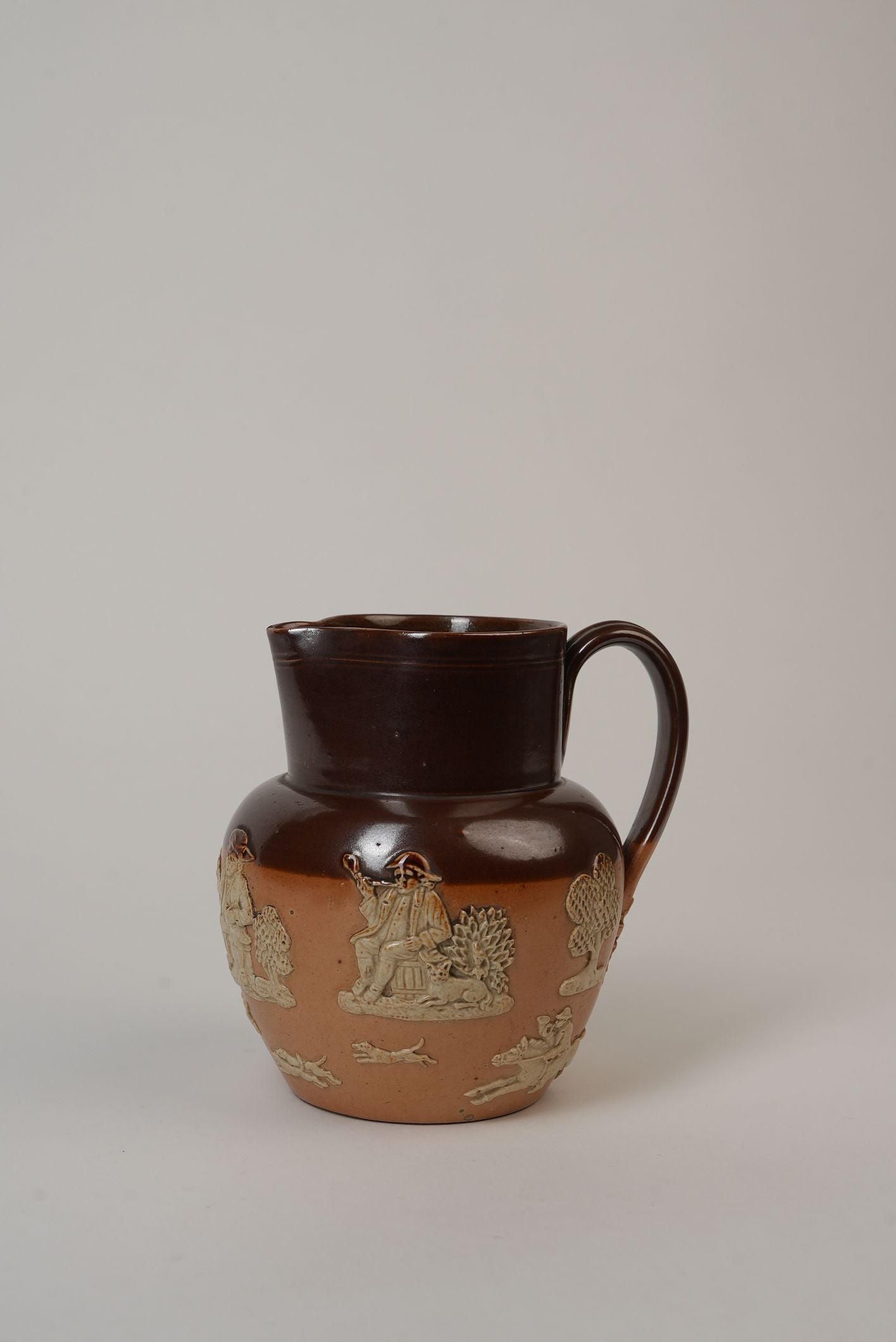 Royal Doulton Stoneware Jug with Moulded Farming Scenes, Edwardian