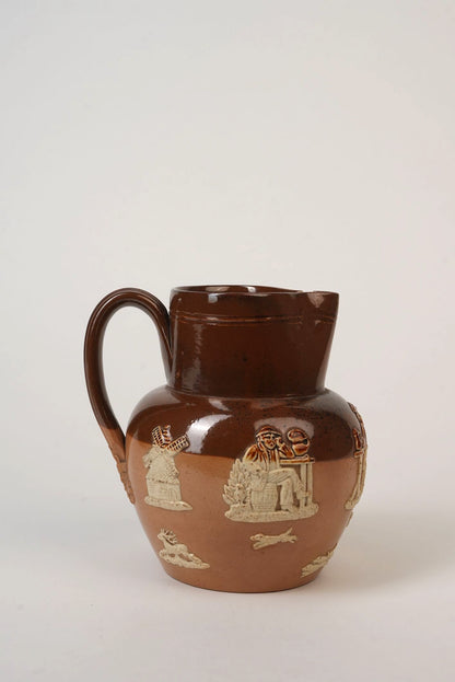 Royal Doulton Stoneware Jug with Moulded Farming Scenes, Edwardian
