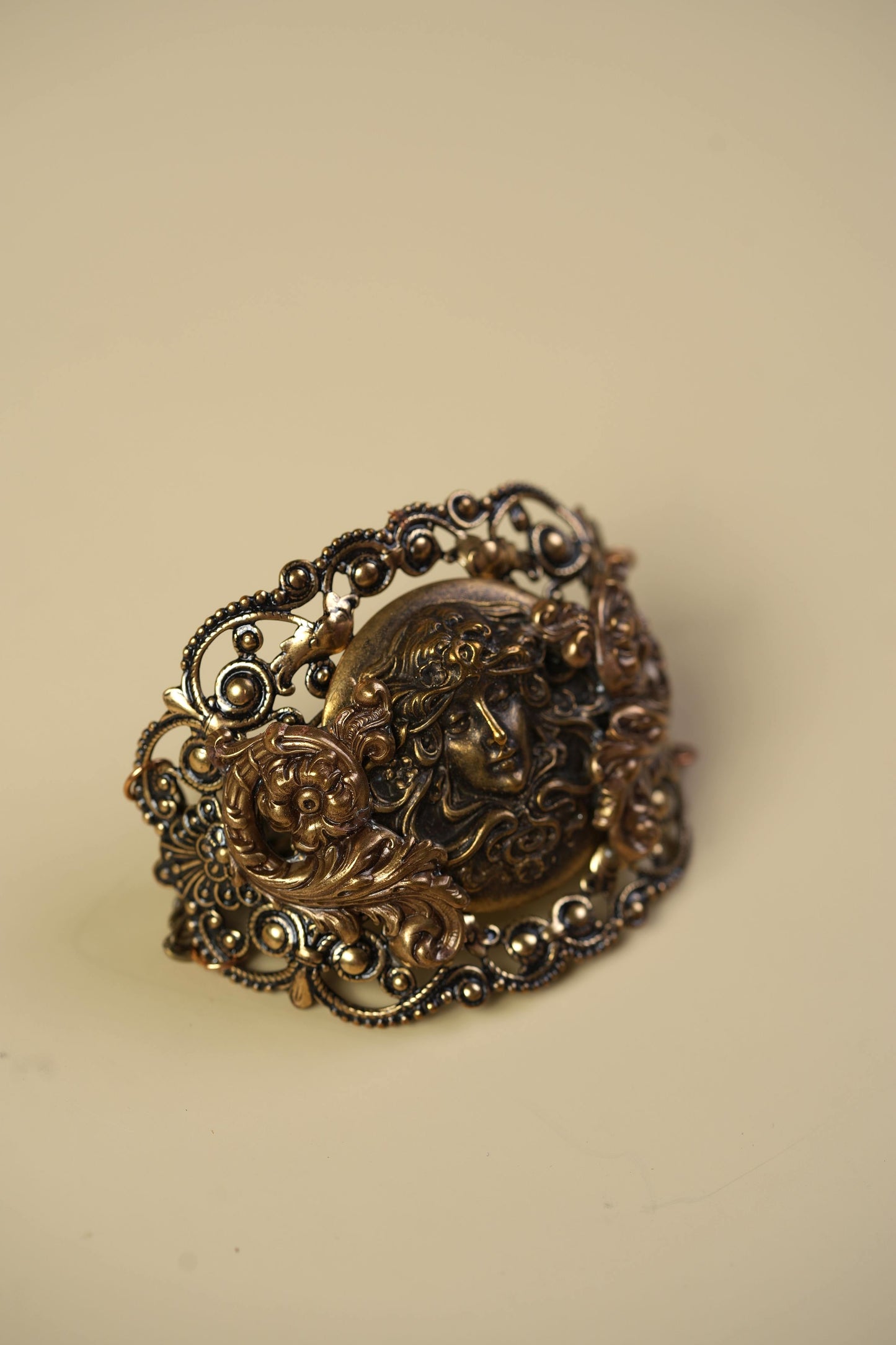 Victorian Brass Hand Cuff with Repousse Classical Face & Filigree Scrollwork
