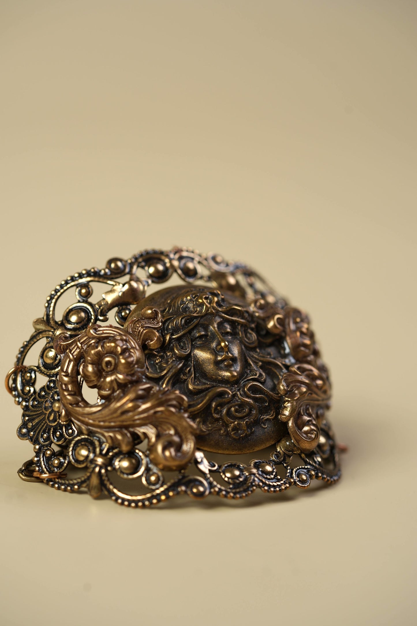 Victorian Brass Hand Cuff with Repousse Classical Face & Filigree Scrollwork
