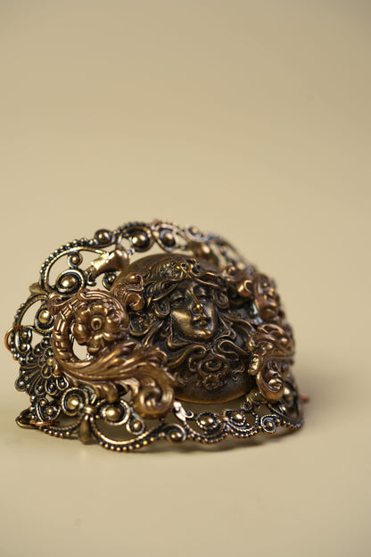 Victorian Brass Hand Cuff with Repousse Classical Face & Filigree Scrollwork