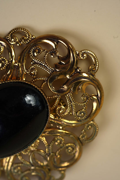 Vintage Black Cabochon Brooch in Gold-Tone Filigree Frame