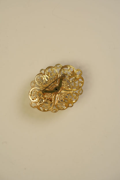 Vintage Black Cabochon Brooch in Gold-Tone Filigree Frame