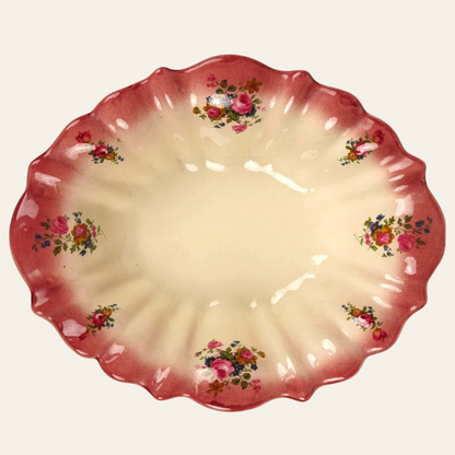 Ceramic plate with floral designs on a white background