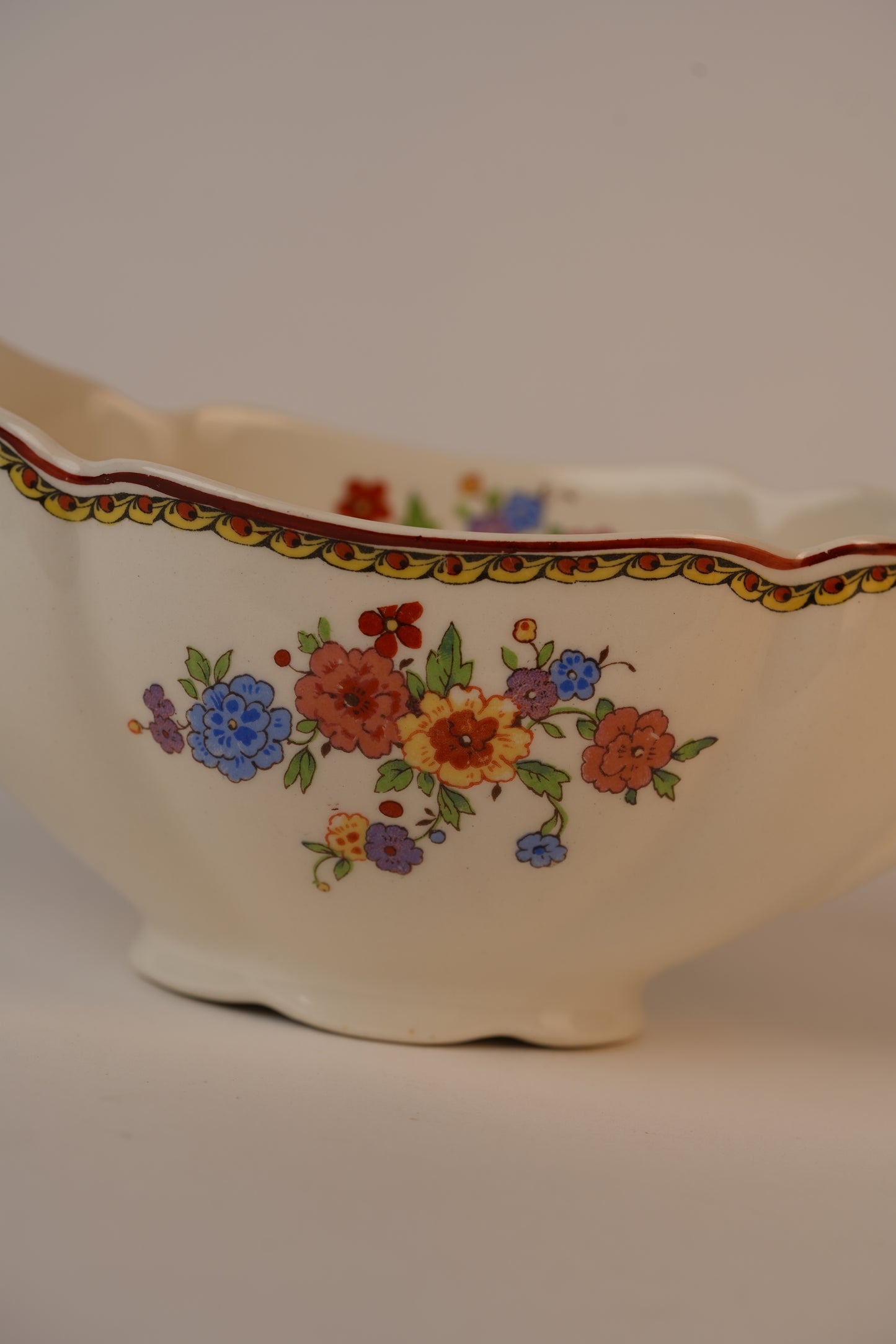 Vintage Gravy Boat With A Delicate Floral Pattern